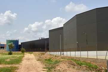 Fototapeta na wymiar Big industrial warehouse building