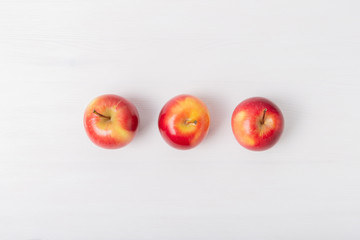 Fresh apples on white background with negative space.