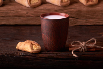 Homemade cakes with cottage cheese on brown wooden table. Studio Photo, selective focus