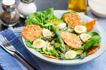 Asparagus Salad with quails eggs and cheese crisps