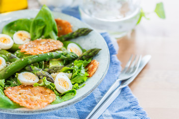 Asparagus Salad with quails eggs and cheese crisps