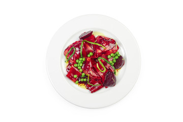 salad with beets, peas and meat isolated on white
