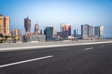 Fototapeta na wymiar Urban buildings and motorized lanes in Macao