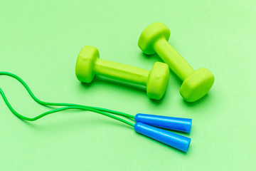 Healthy lifestyle and sport concept composition on wooden background top view