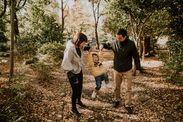 Fototapeta premium Happy japanese family spending time outdoor