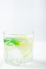Basil lemon water. Drink infused water cocktail. Healthy lifestyle concept. Copy space