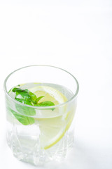 Basil lemon water. Drink infused water cocktail. Healthy lifestyle concept. Copy space