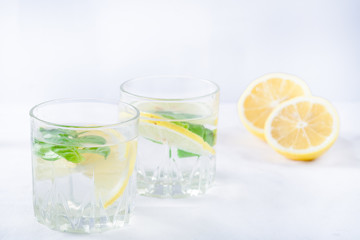 Basil lemon water. Drink infused water cocktail. Healthy lifestyle concept. Copy space