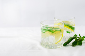 Basil lemon water. Drink infused water cocktail. Healthy lifestyle concept. Copy space