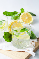 Basil lemon water. Drink infused water cocktail. Healthy lifestyle concept. Copy space