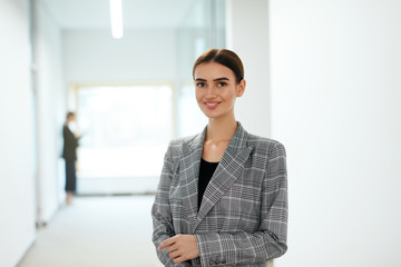 Beautiful Business Woman In Office Portrait