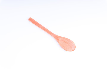 Wooden spoon isolated on white background