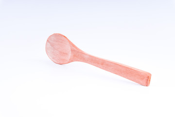 Wooden spoon isolated on white background