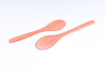 Wooden spoon isolated on white background