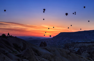 Unreal landscape of Cappadocia. Colorful sunset in valley. G reme National Park of Turkey, background