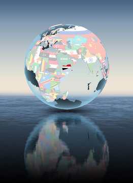 Yemen On Globe With Flags Above Water