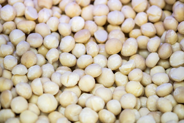 Backround of new harvest Macadamia nuts for sale at the city market