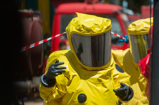 Fireman wear hazmat (hazardous material) suits