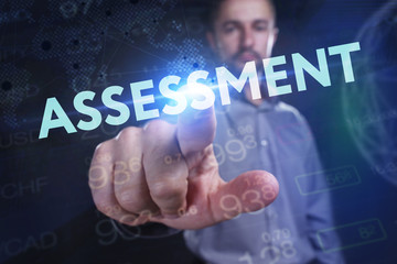 The concept of business, technology, the Internet and the network. A young entrepreneur working on a virtual screen of the future and sees the inscription: assessment