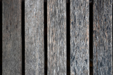 Close up of old brown wood lath with natural striped background and texture.