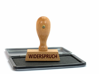 Holzstempel mit Aufdruck Widerspruch