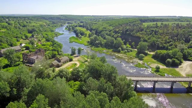 summer landscape drone flies over the river in sunny weather