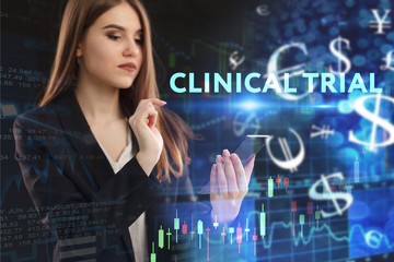 The concept of business, technology, the Internet and the network. A young entrepreneur working on a virtual screen of the future and sees the inscription: Clinical trial