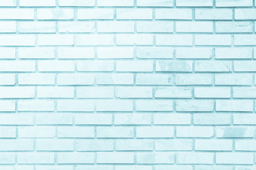 Blue and white brick wall texture background. Brickwork or stonework flooring interior rock old pattern clean concrete grid uneven bricks design stack.
