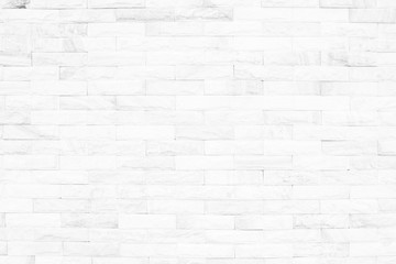 Cream and white brick wall texture background. Brickwork or stonework flooring interior rock old pattern clean concrete grid uneven bricks design stack.