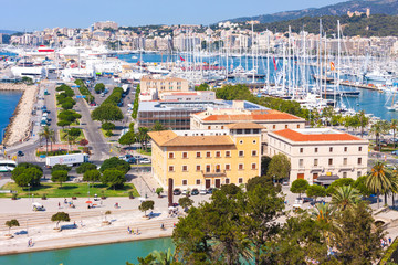 Fototapeta premium View of the port of Palma with luxury yachts from the terrace of the Cathedral of Santa Maria of Palma, also known as La Seu. Palma, Mallorca, Spain