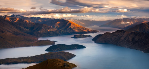 Sunrise landscape panoramic view of lake and mountains from Roy's peak, New Zealand