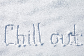 Chill out. Hand drawn text over snow