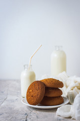 Healthy Breakfast with Oatmeal Cookies and Milk on a light background. Concept Healthy Eating