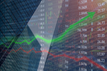 Investing and stock market concept gain and profits with faded candlestick charts.