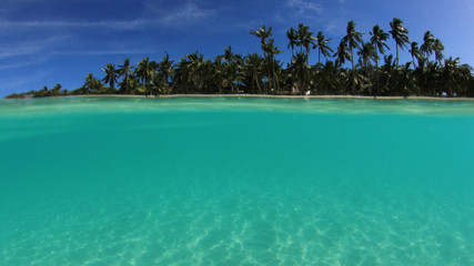 Tropical island and sea - half and half over under split photo