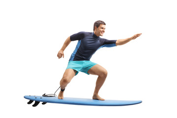Surfer surfing on a surfboard - obrazy, fototapety, plakaty
