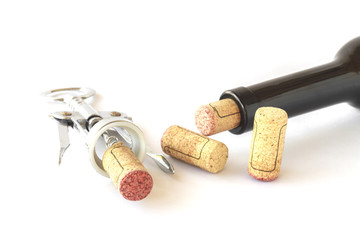 Bottle of red wine with corkscrew.