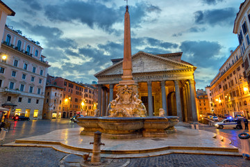 Fototapeta na wymiar The Pantheon with fountain and obelisk at dusk in Rome, Italy
