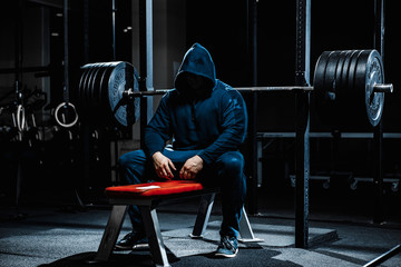 Strong man working in gym