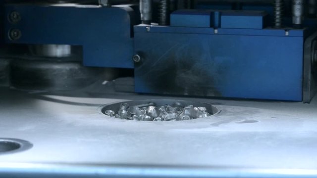 Raising up printing platform with object printed on 3d printer for metal in the working chamber. 3D printer printing metal. Laser sintering machine for metal Progressive DMLS, SLM, SLS technology