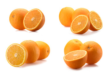 close up view of wholesome and cut oranges isolated on white