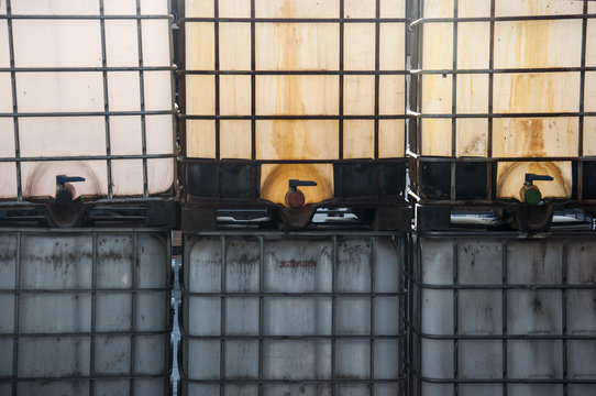 plastic containers filled with chemical liquid fertilizer