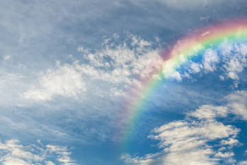 Rainbow in blue sky