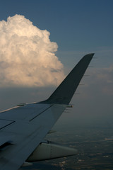 chmury z samolotu - obrazy, fototapety, plakaty