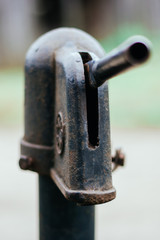 Iron column for water. Rusted iron. Column background in natural environment