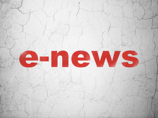 News concept: Red E-news on textured concrete wall background