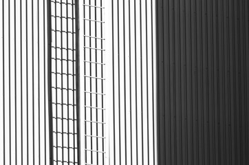 Fototapeta premium Upright ladder on wall background