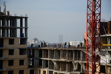 Fototapeta na wymiar Scaffolding, construction of high-rise buildings