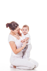 Close up view of attractive young mother with her baby