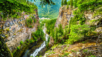Fototapeta na wymiar Spahats Creek deep in the canyon right after Spahats Falls and before it runs into the Clearwater River in Wells Gray Provincial Park at Clearwater British Columbia, Canada 